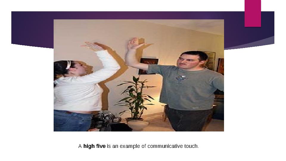 A high five is an example of communicative touch.